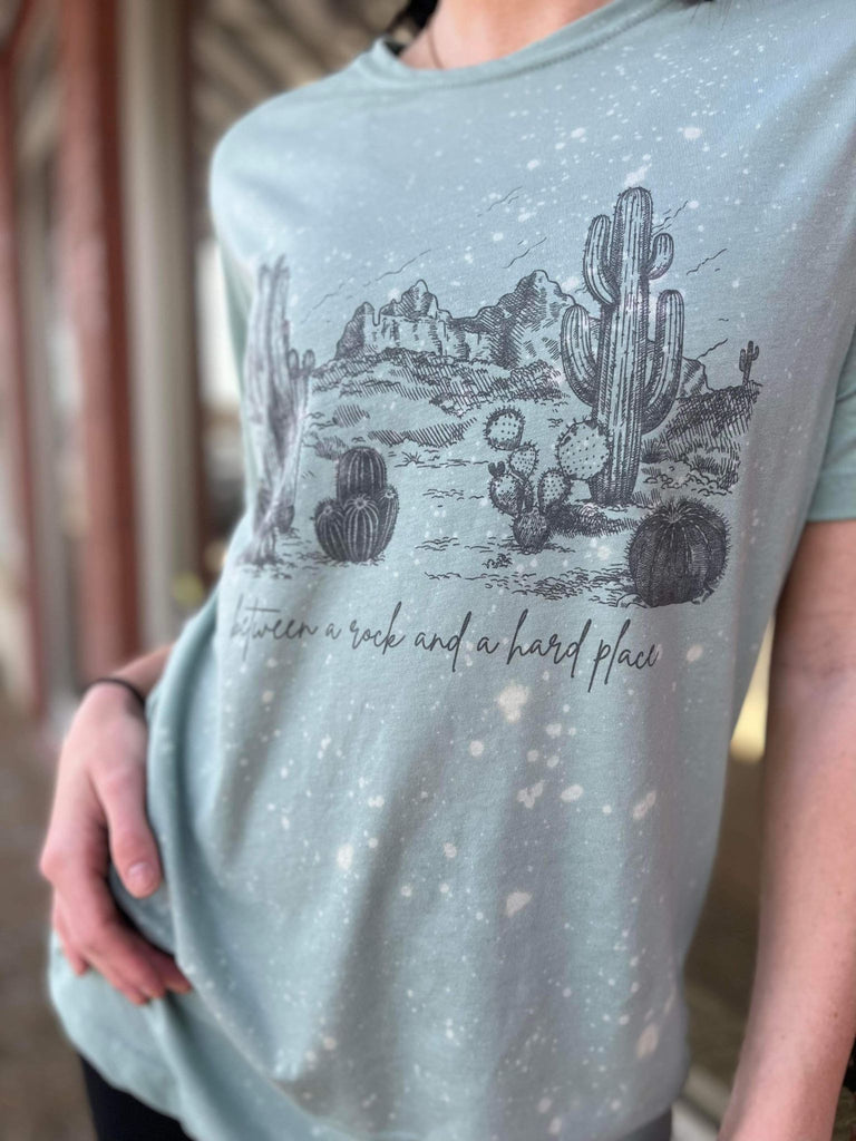 between a rock and a hard place tee ask apparel