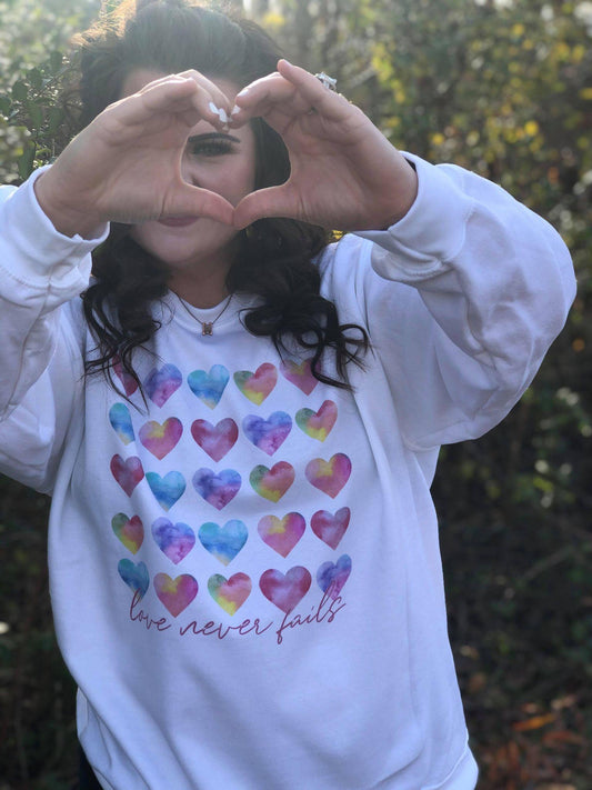 Love Never Fails Sweatshirt-ASK Apparel LLC