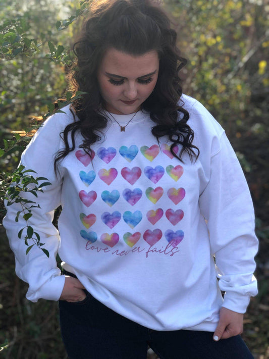 Love Never Fails Sweatshirt-ASK Apparel LLC